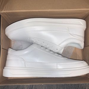 Men’s size 9, women’s size 11, brand new